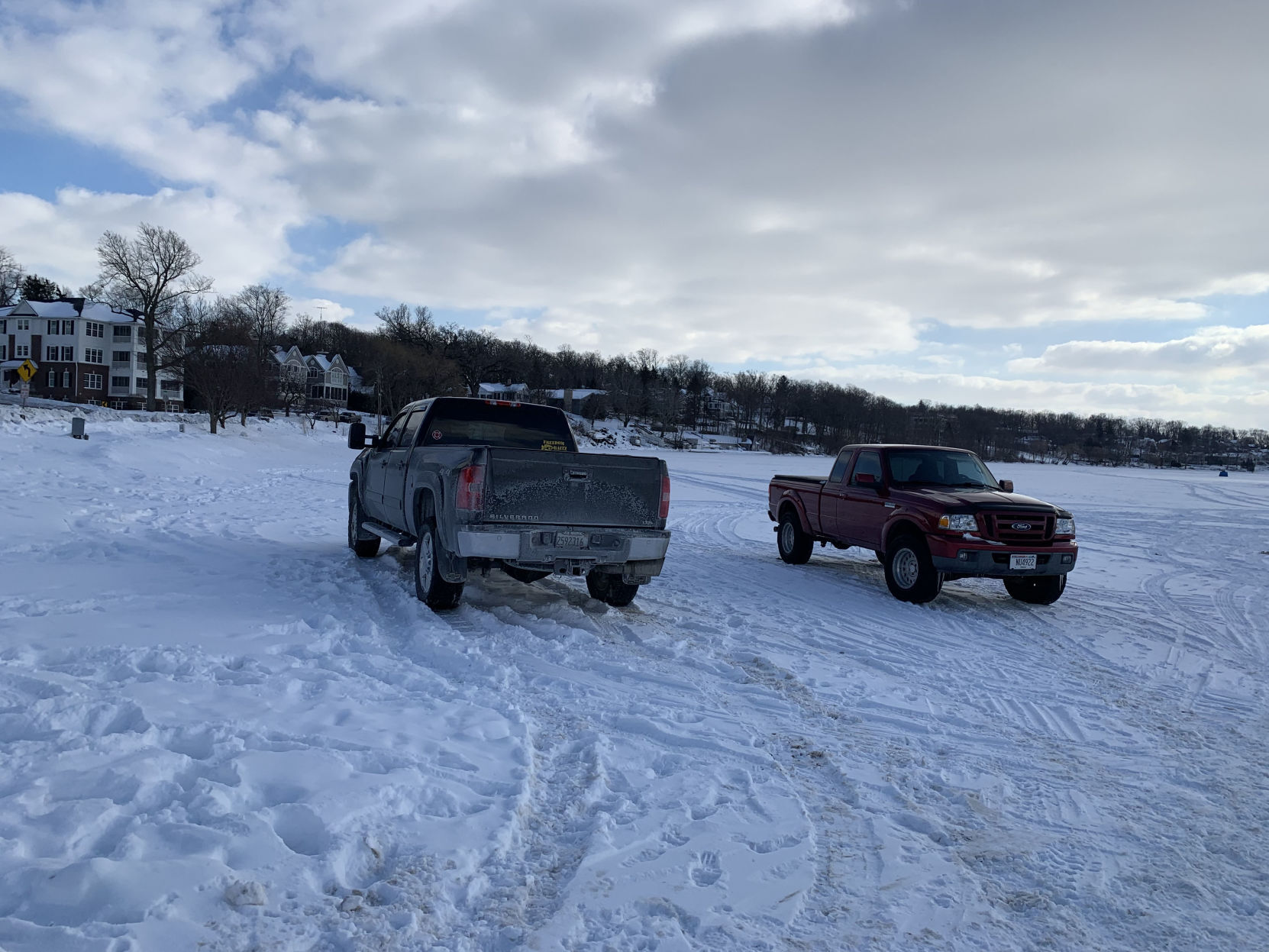 Two vehicles parked on Geneva Lake